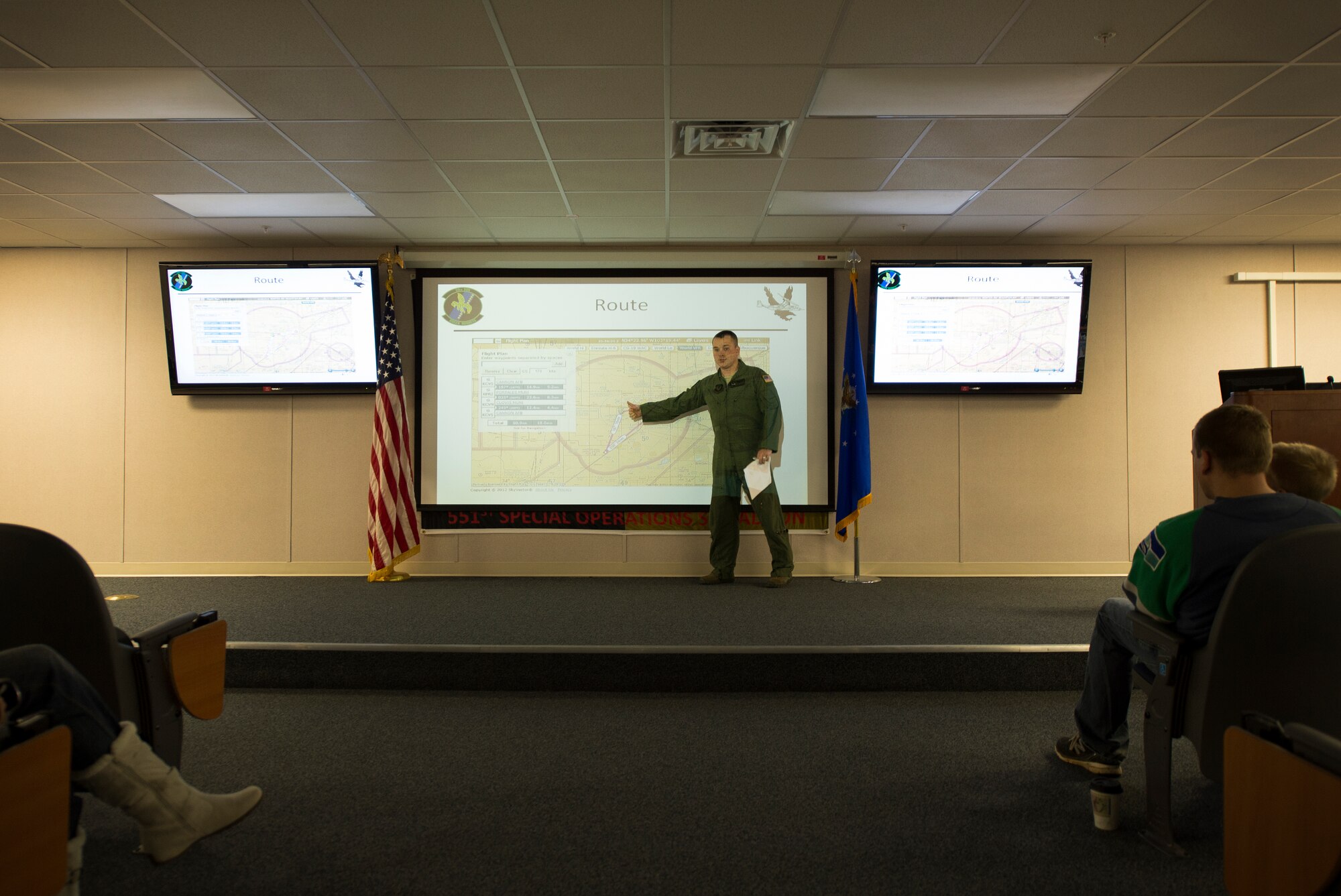 Air Commando spouses receive a pre-flight briefing at the 551st Special Operations Squadron before heading out to the flight line at Cannon Air Force Base, N.M., Oct. 27, 2012. Cannon's annual Spouses Orientation Flights offer a rare opportunity for husbands and wives to take to the skies in a military aircraft. (U.S. Air Force photo/Staff Sgt. Matthew Plew)