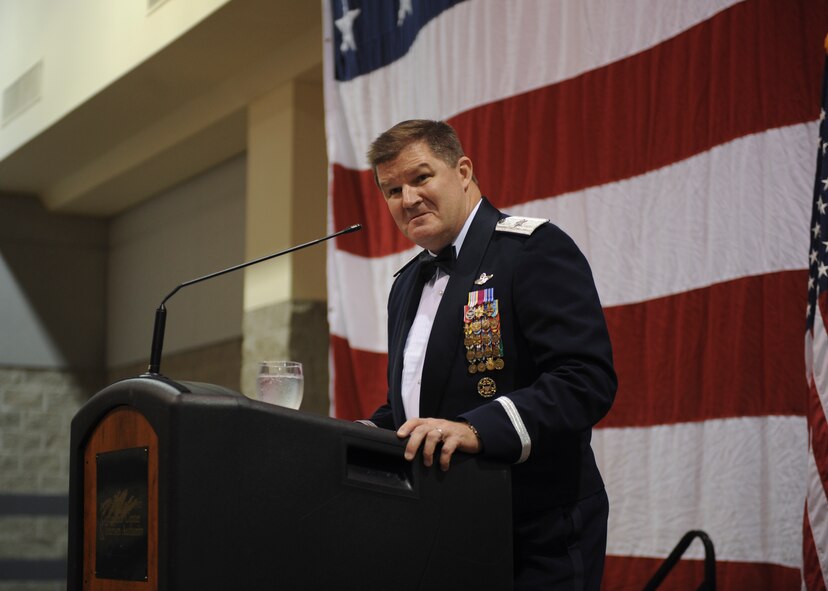 U.S. Air Force Brig. Gen. Thomas “Big” Deale, Air Command and Staff College commandant and Spaatz Center for Officer Education vice commander, speaks during the 2012 Flying Tigers Reunion Dinner at the James H. Rainwater Conference Center in Valdosta, Ga., Oct. 26, 2012.  Throughout his speech, Deale described the impact the Flying Tigers have made throughout history. (U.S. Air Force photo by Airman 1st Class Olivia Bumpers/Released)