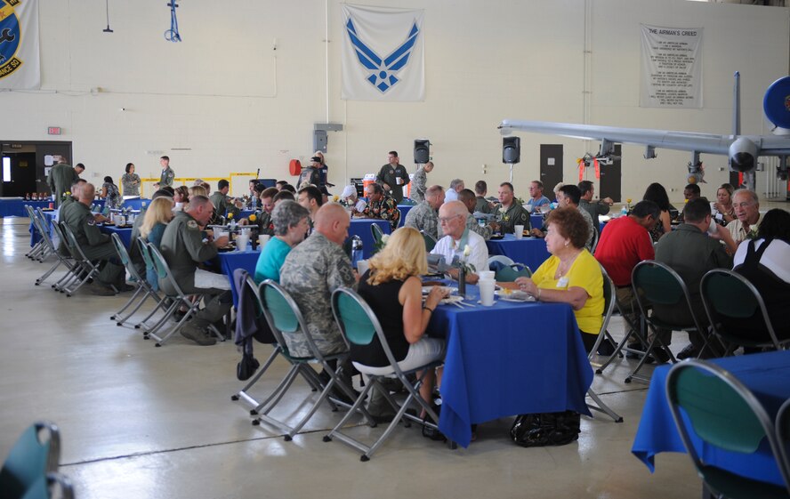 Team Moody and members of the 2012 Flying Tigers Reunion gather for a luncheon at Moody Air Force Base, Ga., Oct. 25, 2012. Moody hosted the reunion to celebrate the 71st anniversary of the Flying Tigers. (U.S. Air Force photo by Airman 1st Class Olivia Bumpers/Released)