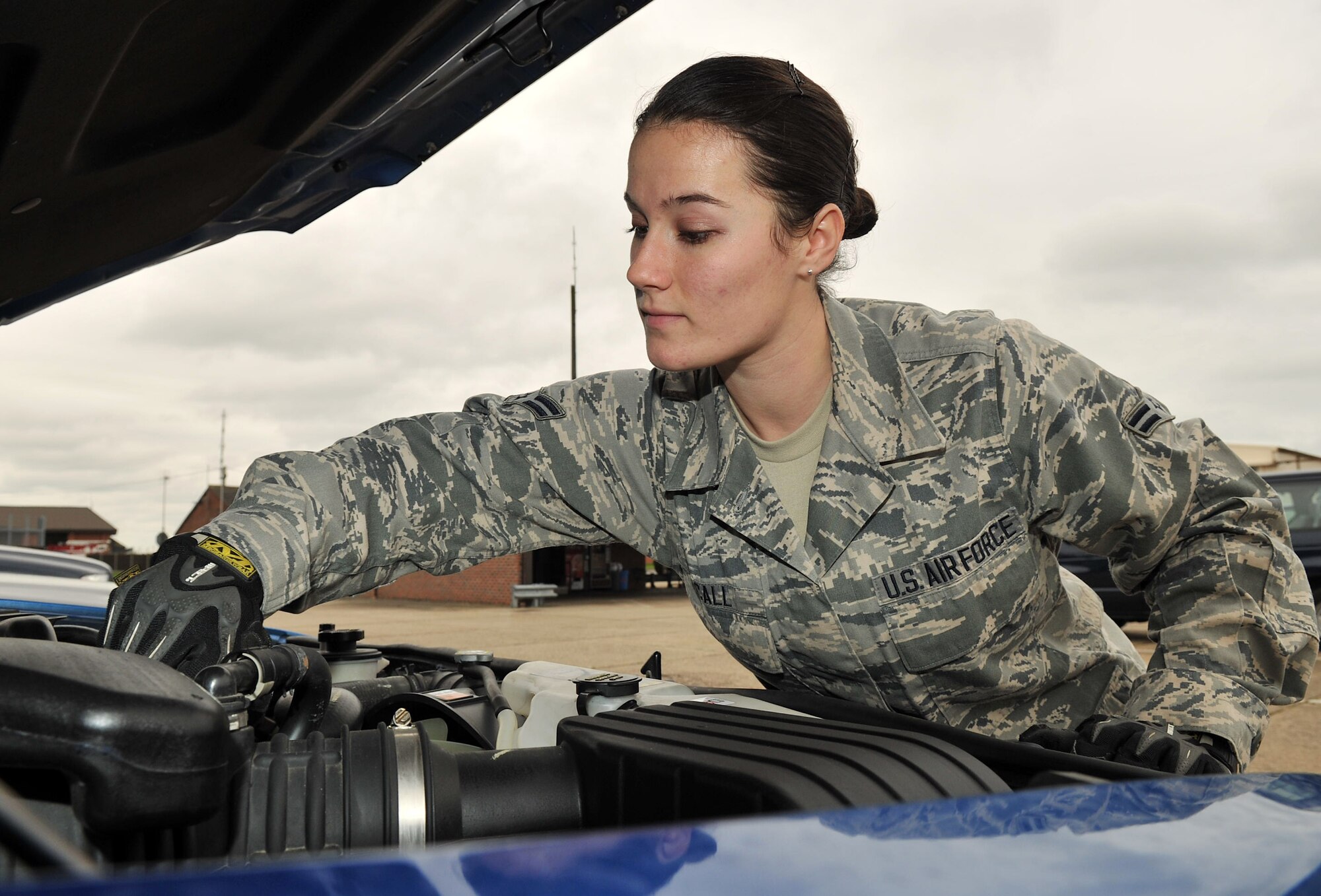 Airman 1st Class Jessie D. McCall, 100th Logistics Readiness Squadron vehicle operator and dispatcher, performs an operations check on a vehicle Oct. 25, 2012, at RAF Mildenhall, England. (U.S. Air Force photo by Senior Airman Jerilyn Quintanilla/Released) 