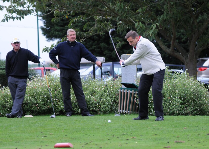 Col. Christopher Kulas, 100th Air Refueling Wing commander, tees off at the first hole during the British American Committee Challenge Cup golf tournament Oct. 26, 2012, at Breckland Pines Golf Course on RAF Lakenheath, England. The BAC Challenge Cup was a Ryder Cup-style tournament played with teams of four. (U.S. Air Force photo by Airman 1st Class Kelsey Waters/ Released)