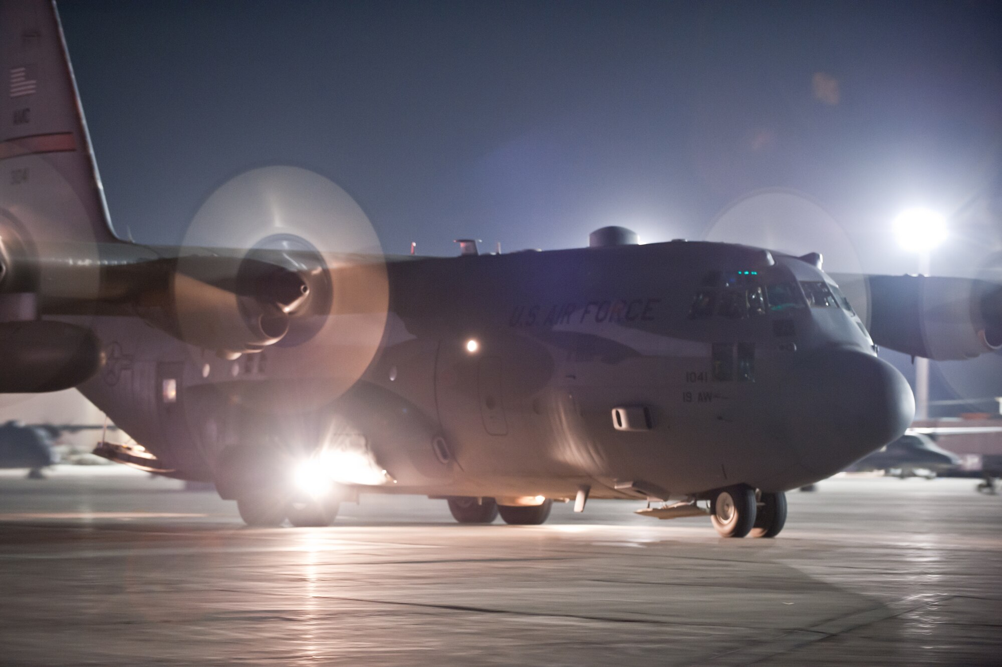 A C-130H Hercules taxis on the runway prior to taking off on a night mission at Bagram Airfield, Afghanistan, Oct. 25, 2012. The C-130H is a tactical airlift workhorse for American and coalition forces in Afghanistan. (U.S. Air Force Photo/Staff Sgt. Jeff Nevison)