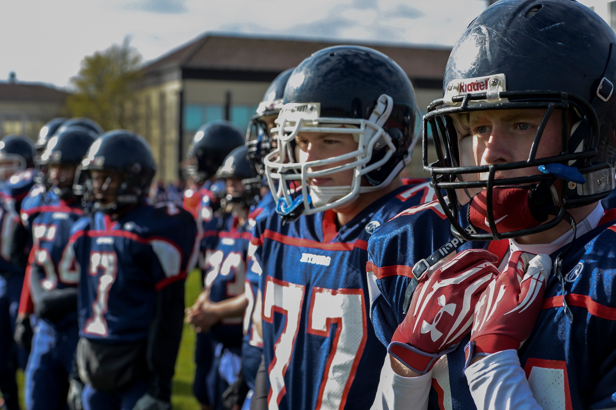 BITBURG ANNEX, Germany -- Ryan Hartwell, right, Bitburg Barons tight end from Panama City, Fla., looks on as his team defends the field against the Hohenfels Tigers Oct. 27, 2012, at Rik Carr Field. The Barons’ won their final home game 56-14. The Barons play the championship game against the Naples Wildcats at Baumholder 2: 30 p.m., Nov. 3, 2012. The Wildcats and Barons are both undefeated. (U.S. Air Force photo by Senior Airman Natasha Stannard/Released)