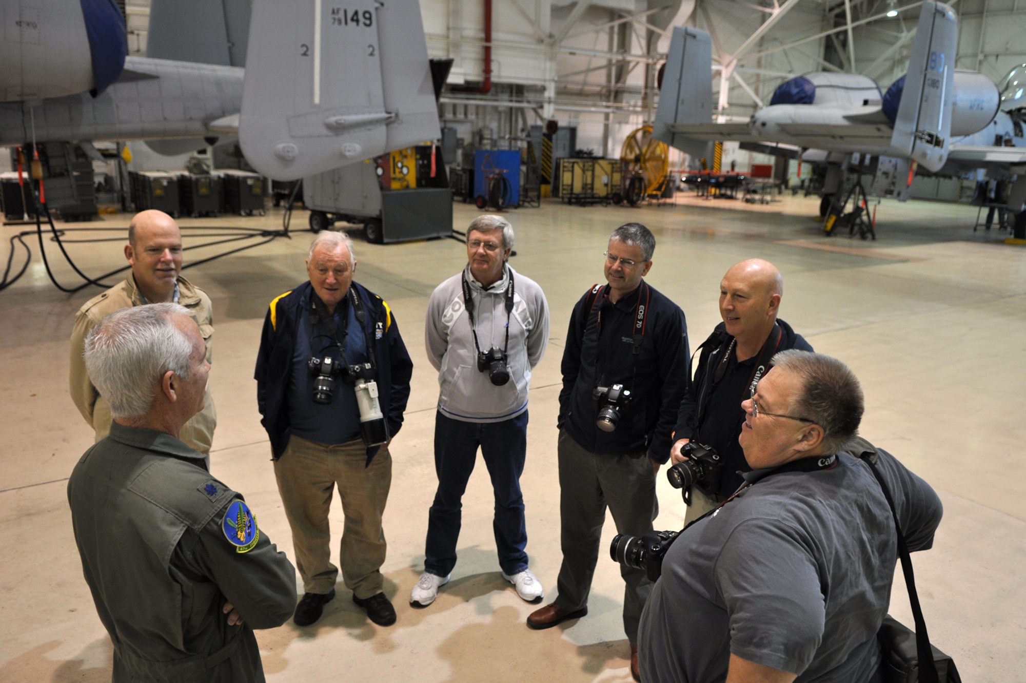 (L to R) U.S. Air Force Lt. Col. Thomas Cruzan, who is a pilot assigned to the 47th Fighter Squadron, discusses wartime capabilities of the A-10 Thunderbolt II with Mark Young, John Hutchins, Alan Cole, David Rickwood, Stewart Dempster and Alan Kilham in the A-10 Hangar at Barksdale Air Force Base, La., Oct. 26, 2012. The British visitors to Barksdale are members of the RAF Fairford Aviation Society in England. They will also attend the “Wings Over Houston Air Show” at the Ellington Airport during their visit to the United States. (U.S. Air Force photo by Master Sgt. Jeff Walston)   
