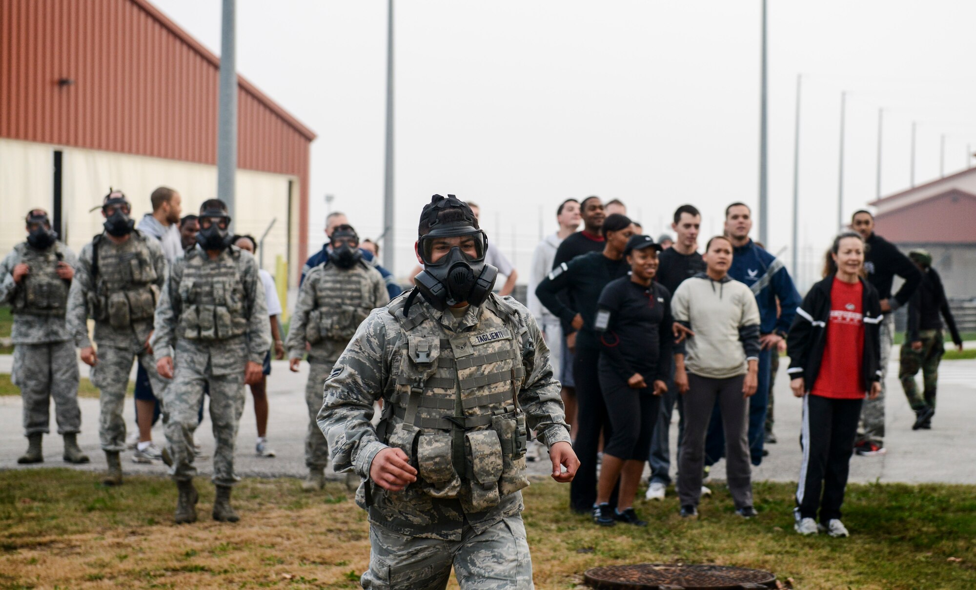 Airman 1st Class Nicholas Taglienti, 31st Security Forces Squadron, prepares to vault a wall during the 2nd Annual Tech. Sgt. Israel Del Toro Combat Run held Oct. 26 at Aviano Air Base, Italy. The combat run included a wall jump, balance beam, low crawl course, sandbag carry and several other obstacles on the 5-kilometer course. (U.S. Air Force photo by Senior Airman Katherine Tereyama)
