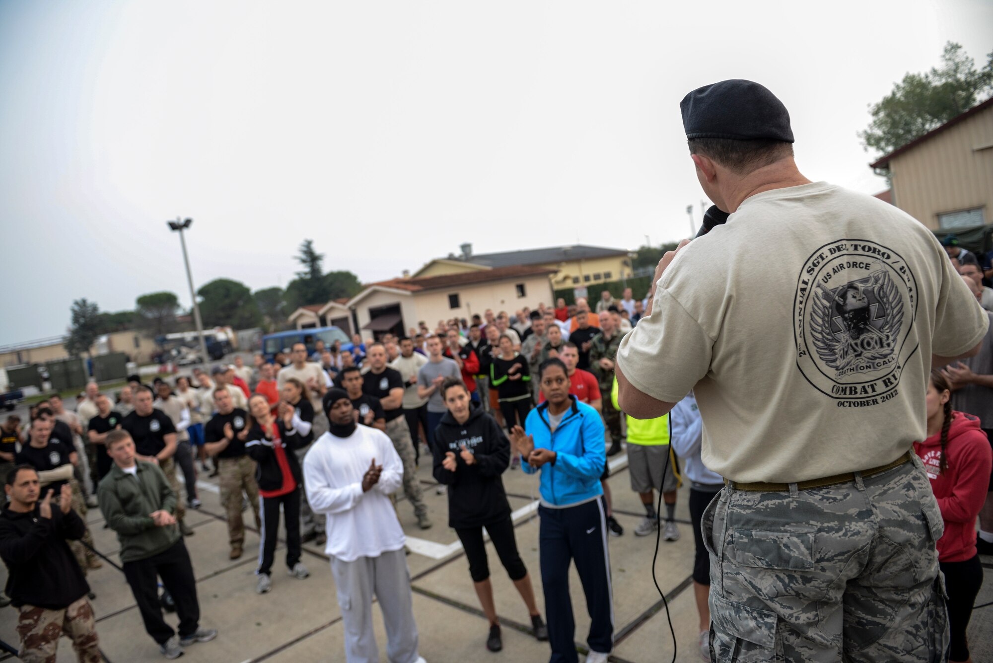 Master Sgt. Shawn Minyon, 8th Air Support Operations Squadron superintendent and first sergeant, speaks during the 2nd Annual Tech. Sgt. Israel Del Toro Combat Run Oct. 26 at Aviano Air Base, Italy. Before the run, Minyon took the opportunity to remember the sacrifices made by wounded warriors and to share the example of Del Toro, a former member of the 8th ASOS wounded in Afghanistan in 2005. (U.S. Air Force photo by Senior Airman Katherine Tereyama) 