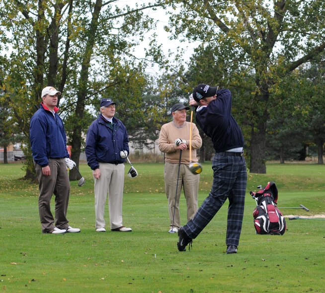 Tech. Sgt. Jason Krokos, 748th Aircraft Maintenance Squadron, 56th Helicopter Maintenance Unit assistant section chief, drives off the 370-yard par-four eighth hole Oct. 26, 2012, during the British American Challenge Cup golf tournament held at Breckland Pines Golf Club, RAF Lakenheath, England. The tournament is held once a year to foster Anglo-American relations. (U.S. Air Force photo by Gary Rogers/Released) 