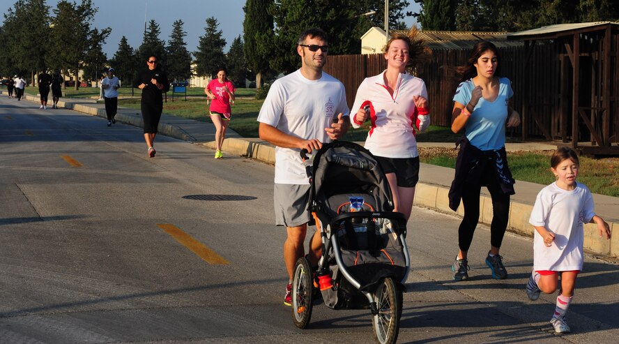 Airmen and family members participate in the Triple Ribbon 5k run Oct. 27, 2012, at Incirlik Air Base, Turkey. All family members were encouraged to participate, and children were able to to walk, run or ride a bike. (U.S. Air Force photo by Senior Airman Anthony Sanchelli/Released)
