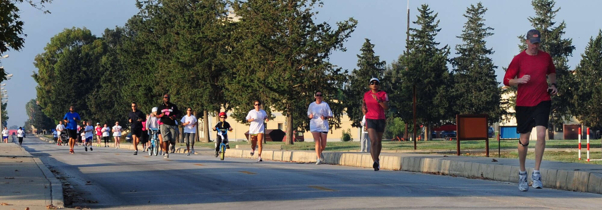 Airmen and family members participate in the Triple Ribbon 5k run Oct. 27, 2012, at Incirlik Air Base, Turkey. All family members were encouraged to participate, and children were able to walk, run or ride a bike. (U.S. Air Force photo by Senior Airman Anthony Sanchelli/Released)
