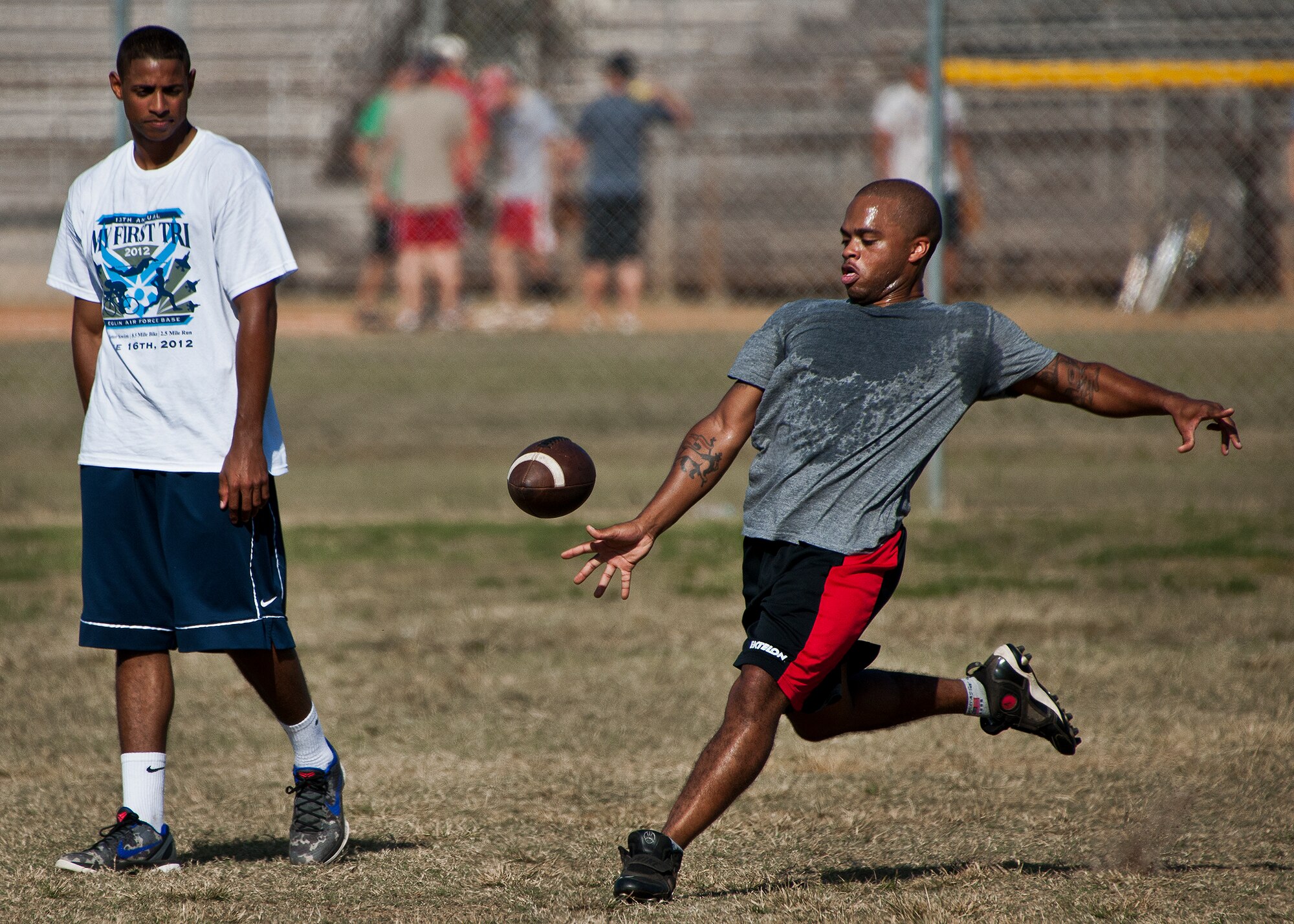 An Airman, with the 96th Force Support Squadron, kicks off another round of ultimate football at a 96th Mission Support Group sports day Oct. 26 at Eglin Air Force Base, Fla.  Eglin Airmen participated in ultimate football, track and field events, softball and golf.  The event helped raise money for the Combined Federal Campaign.  (U.S. Air Force photo/Samuel King Jr.)