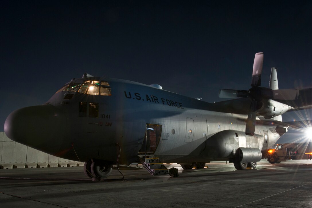 A C-130H Hercules sits ready to conduct a night mission at Bagram Airfield, Afghanistan, Oct. 25, 2012. Bagram's C-130 aircrews fly day and night to transport personnel and supplies throughout Afghanistan. (U.S. Air Force photo/Capt. Raymond Geoffroy)