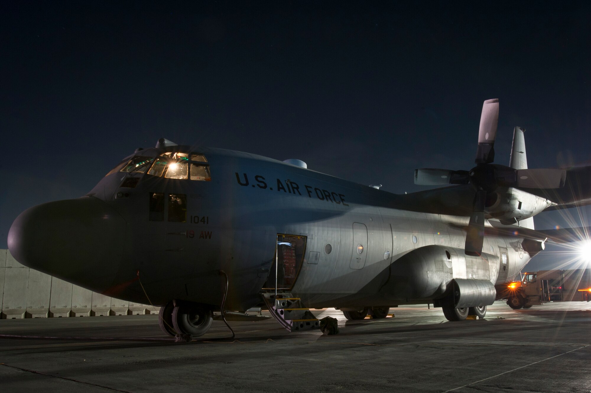 A C-130H Hercules sits ready to conduct a night mission at Bagram Airfield, Afghanistan, Oct. 25, 2012. Bagram's C-130 aircrews fly day and night to transport personnel and supplies throughout Afghanistan. (U.S. Air Force photo/Capt. Raymond Geoffroy)