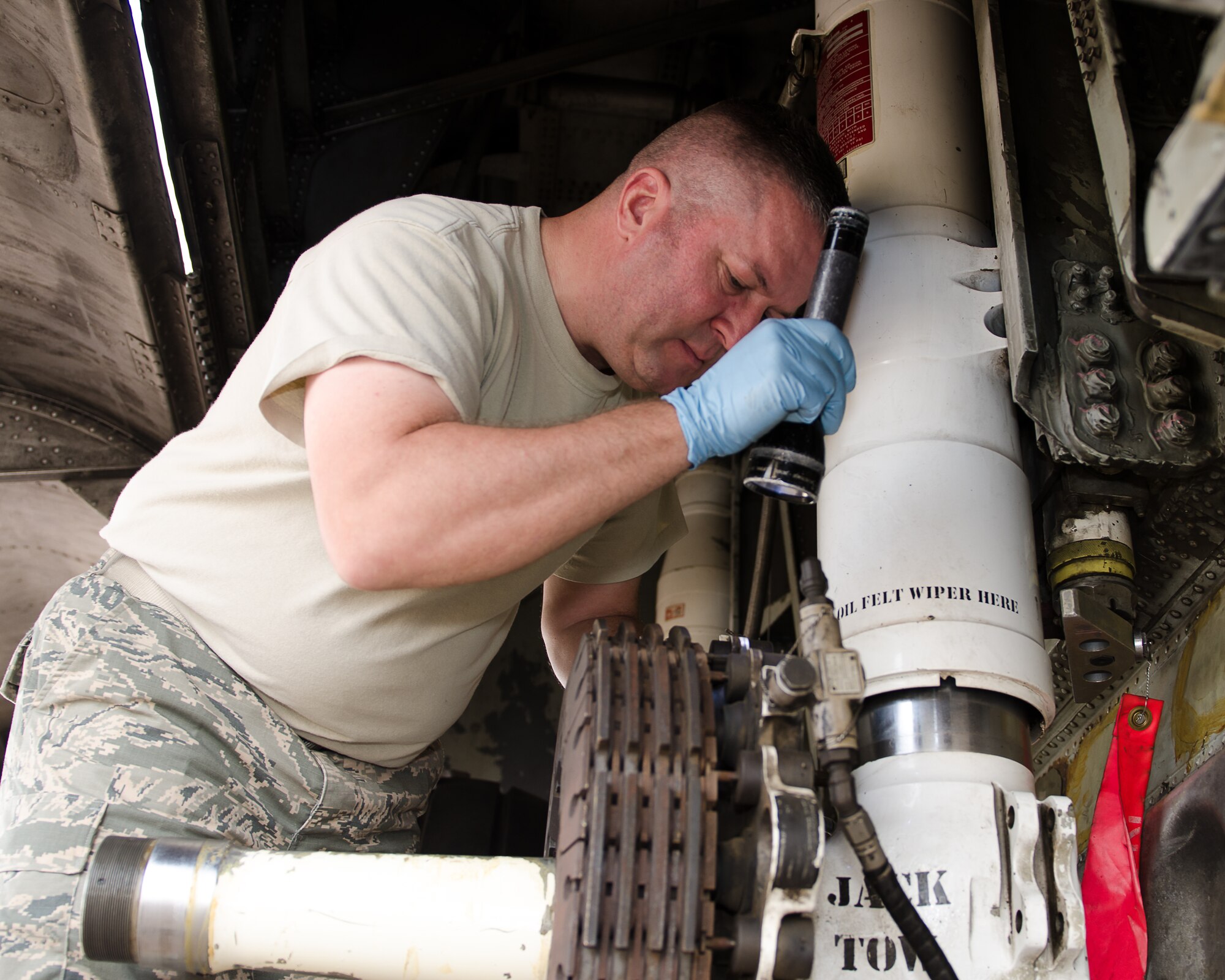 Master Sgt. Stephen Pirtle, C-130 maintainer from the New Mexico Air National Guard's 150th Fighter Wing at Kirtland Air Force Base, conducts an inspection during the C-130 aircraft maintenance apprentice course at Sheppard Air Force Base, Texas, Oct. 26, 2012.  Pirtle earned the "ACE" award for achieving a 100 percent average for the entire course. (U.S. Air Force courtesy photo)