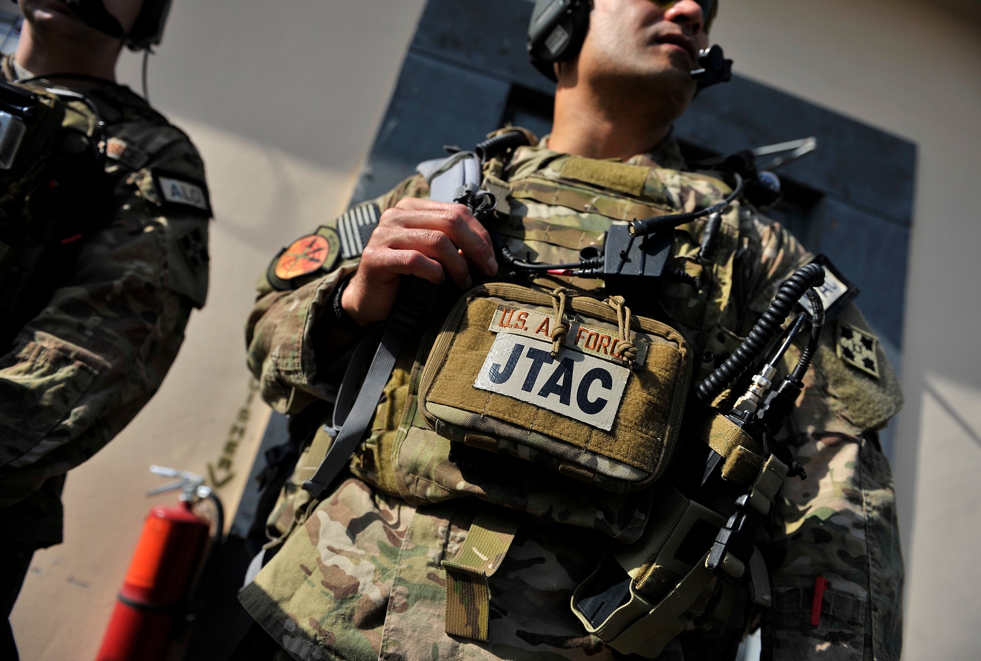 U.S. Air Force Tech. Sgt. Mitchell Polu, Joint Terminal Attack Controller, 817th Expeditionary Air Support Operations Sq., waits to board an aircraft during a battlefield circulation mission in the Kunar Province of Afghanistan, Oct. 6, 2012. Polu and fellow JTAC members provide ground forces with air superiority by controlling overhead aircraft that are able to deliver multiple weapons systems, as well as intelligence, surveillance, and reconnaissance capabilities. JTACs and radio operators, maintainers, and drivers train and operate alongside their Army counterparts in order to prepare them for kinetic situations while outside-the-wire. (U.S. Air Force photo/Staff Sgt. Clay Lancaster)