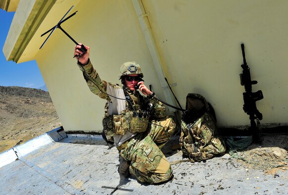Airman 1st Class Joseph Farmer, Tactical Air Control Party member, 817th Expeditionary Air Support Operations Squadron, sets up ground communications with overhead aircraft during a mission in the Kunar Province of Afghanistan, July 3, 2012. Farmer is also a Radio Operation, Maintainer, and Driver who is currently in upgrade training to become a Joint Terminal Attack Controller. Farmer and other JTAC members provide ground forces with air superiority by controlling overhead aircraft that are able to deliver multiple weapons systems, as well as intelligence, surveillance, and reconnaissance capabilities. JTACs and ROMADs train and operate alongside their Army counterparts in order to prepare them for kinetic situations while outside-the-wire. (U.S. Air Force photo/Staff Sgt. Clay Lancaster) 


