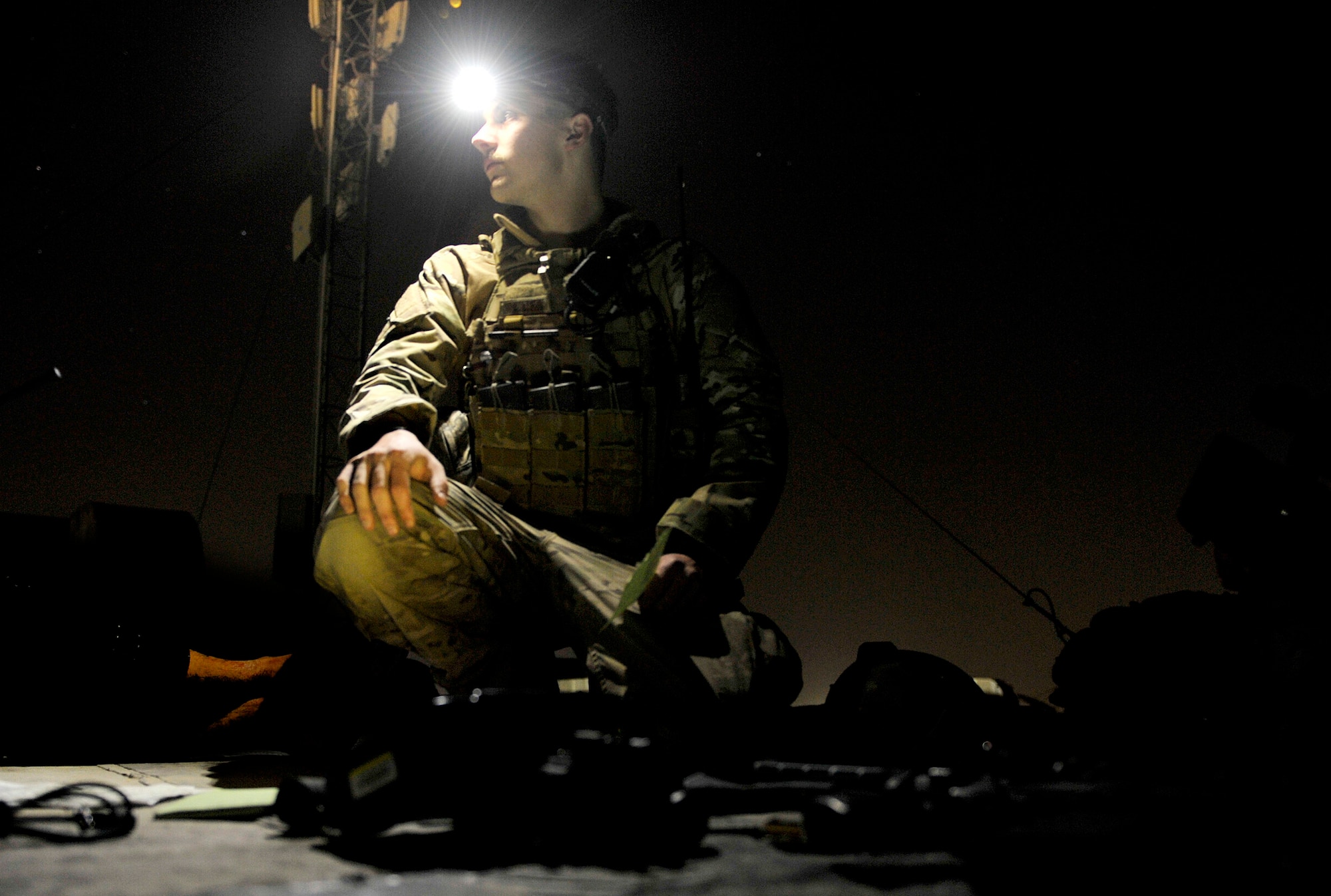 U.S. Air Force Senior Airman Caleb Mason, Tactical Air Control Party member, controls two A-10 Thunderbolts during close air support training at Forward Operating Base Fenty, Afghanistan, Oct. 11, 2012. Mason is also a Radio Operator, Maintainer, and Driver, where he is trained and metored by Joint Terminal Attack Controllers in an operational deployed environment before going to the JTAC qualification course. JTAC members provide ground forces with air superiority by controlling overhead aircraft that are able to deliver multiple weapons systems, as well as intelligence, surveillance, and reconnaissance capabilities. JTACs and ROMADs train and operate alongside their Army counterparts in order to prepare them for kinetic situations while outside the wire. (U.S. Air Force photo/Staff Sgt. Clay Lancaster)