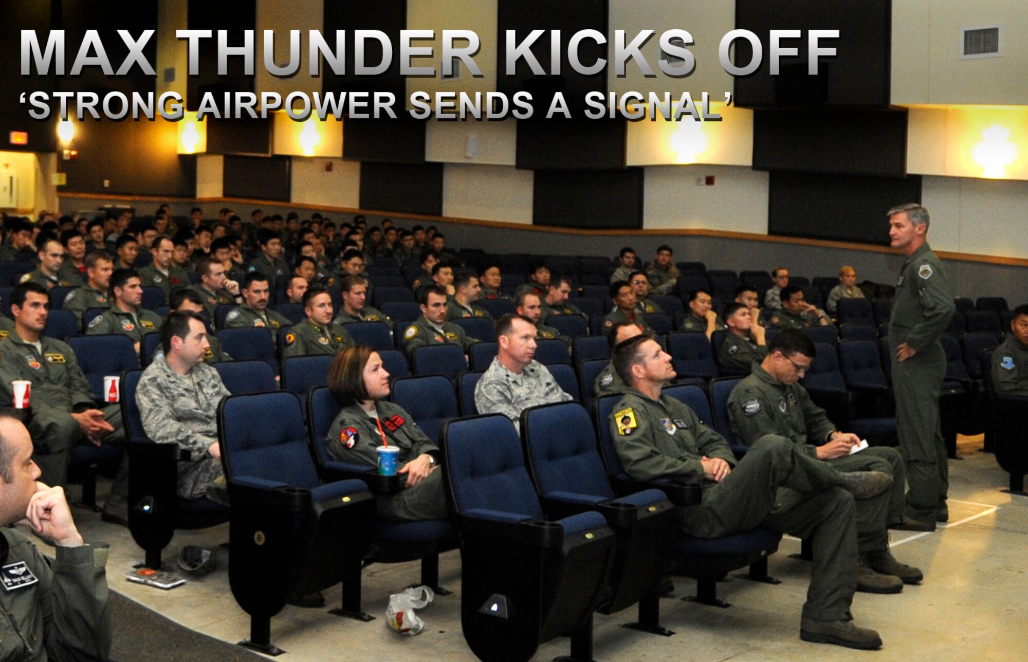 Col. John Pearse, 8th Fighter Wing commander, addresses participants of Max Thunder 12-2 Oct. 26, 2012, at Kunsan Air Base, Republic of Korea. The exercise is designed to sharpen U.S. and Republic of Korea Air Force integration and combat capabilities. (U.S. Air Force illustration/Senior Airman Brigitte N. Brantley)