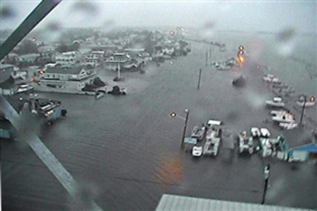 Water floods Coast Guard Station Barnegat Light, N.J., and the surrounding area, Oct. 29, 2012, as Hurricane Sandy moves into the area. The storm is expected to bring life-threatening storm surge and coastal hurricane winds. 