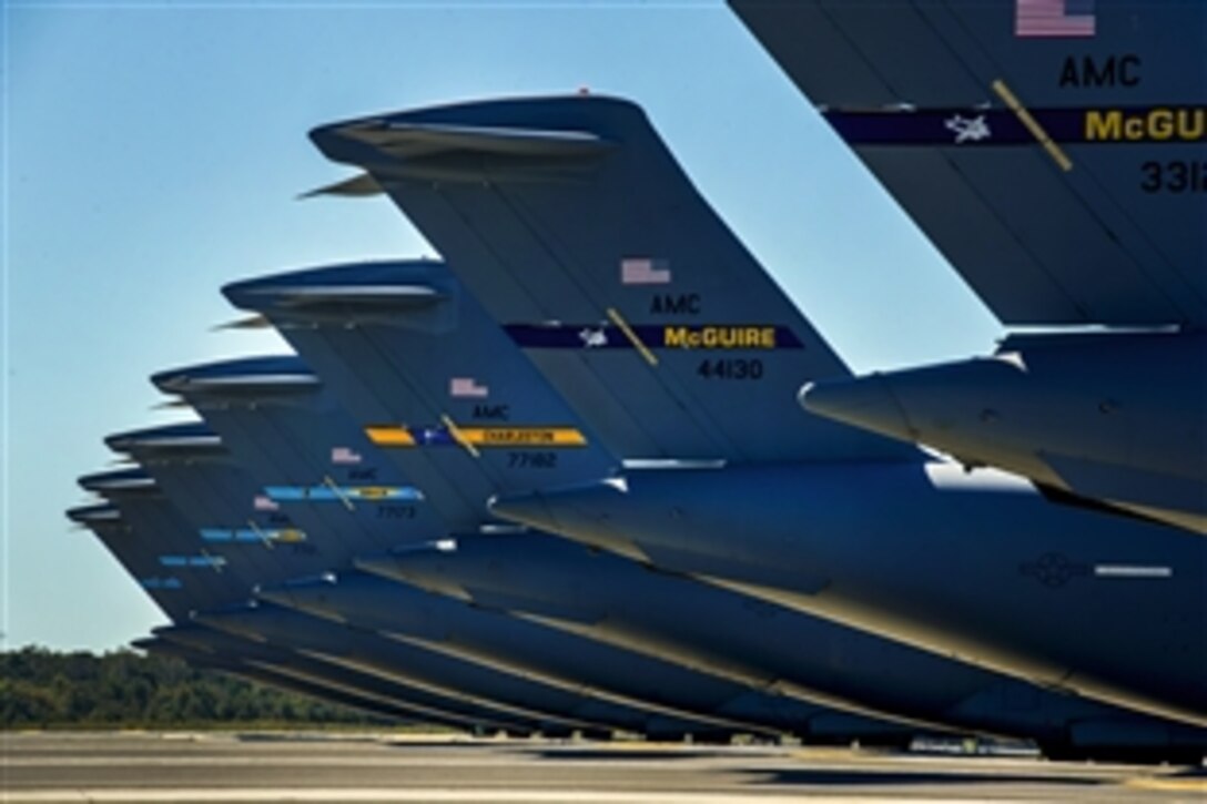 C-17 Globemaster IIIs sit on the tarmac on Joint Base Charleston Air Base, S.C., Oct. 29, 2012. Aircraft, including C-17s from Joint Base McGuire-Dix-Lakehurst and Dover Air Force Base, arrived over the weekend, following the intensity of Hurricane Sandy in the Northeast.