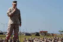 SgtMaj. Steven D. Morefield. speaks to Marines and Sailors at a brief on Camp Kinser Oct. 25. During the brief Morefield and Lieutenant General Kenneth J. Glueck Jr. spoke about local issues, the new liberty policy, sexual assault and hazing awareness and the commandant of the Marine Corps’ guidance. Morefield is the III Marine Expeditionary Force Sergeant Major, Glueck is the commanding general for III MEF and the Marines and Sailors are a part of 3rd Marine Logistics Group, III MEF.