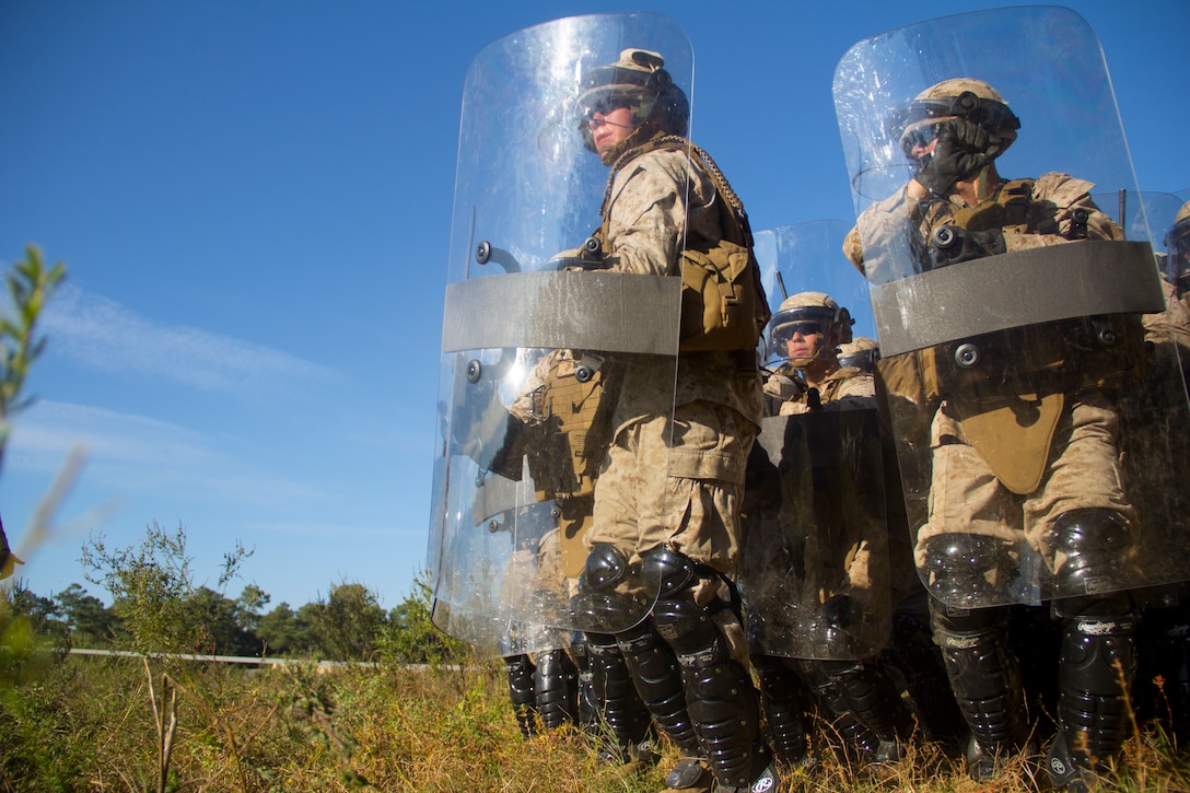 Marines of Combat Logistics Battalion (CLB) 26, led by Marines from the military police platoon, learn the basics of nonlethal weapons training at Camp Lejeune, N.C., 24 Oct., 2012. CLB-26 is one of the three reinforcements of 26th Marine Expeditionary Unit, which is slated to deploy in 2013.