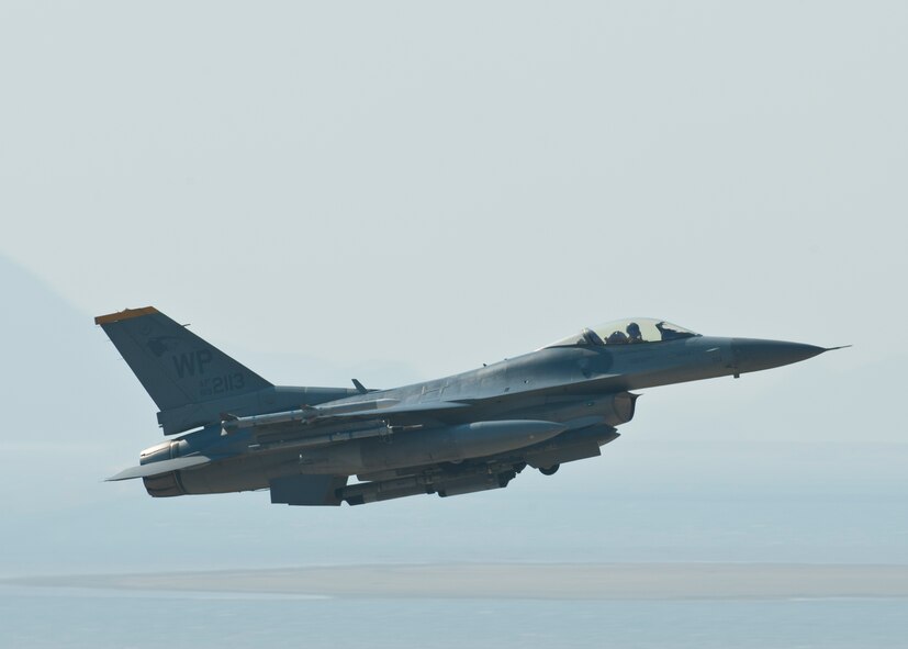 An F-16 Fighting Falcon with the 80th Fighter Squadron flies over Kunsan Air Base, Republic of Korea, during Max Thunder 12-2, Oct. 30, 2012. The exercise featured numerous aircraft from both U.S. and ROK air forces including F-16s and F-15K Slam Eagles. (U.S. Air Force photo/Staff Sgt. Jonathan Fowler)