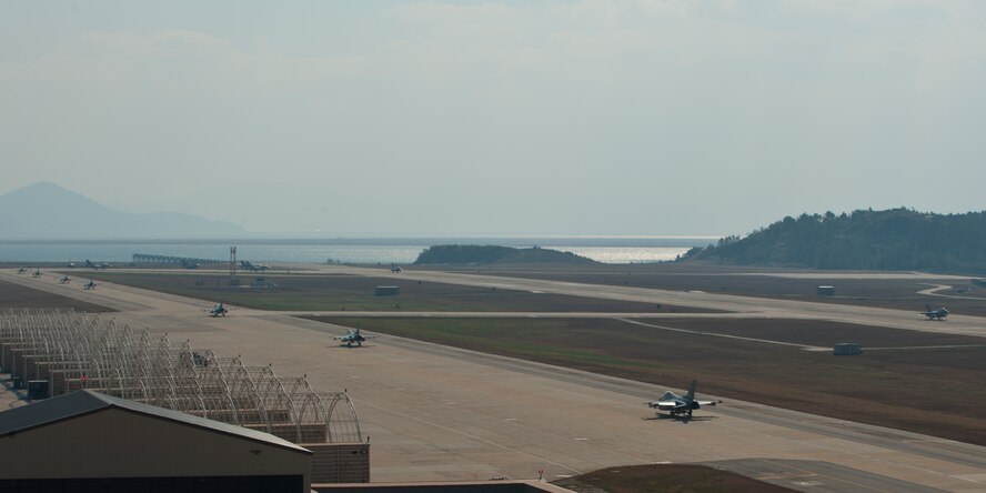 F-16 Fighting Falcons with U.S. and Republic of Korea air forces taxi and takeoff during Max Thunder 12-2 on Kunsan Air Base, ROK, Oct. 30, 2012. Max Thunder is a joint exercise that allows the two Air Forces to work side by side and practice various wartime scenarios. (U.S. Air Force Photo/Staff Sgt. Jonathan Fowler)
