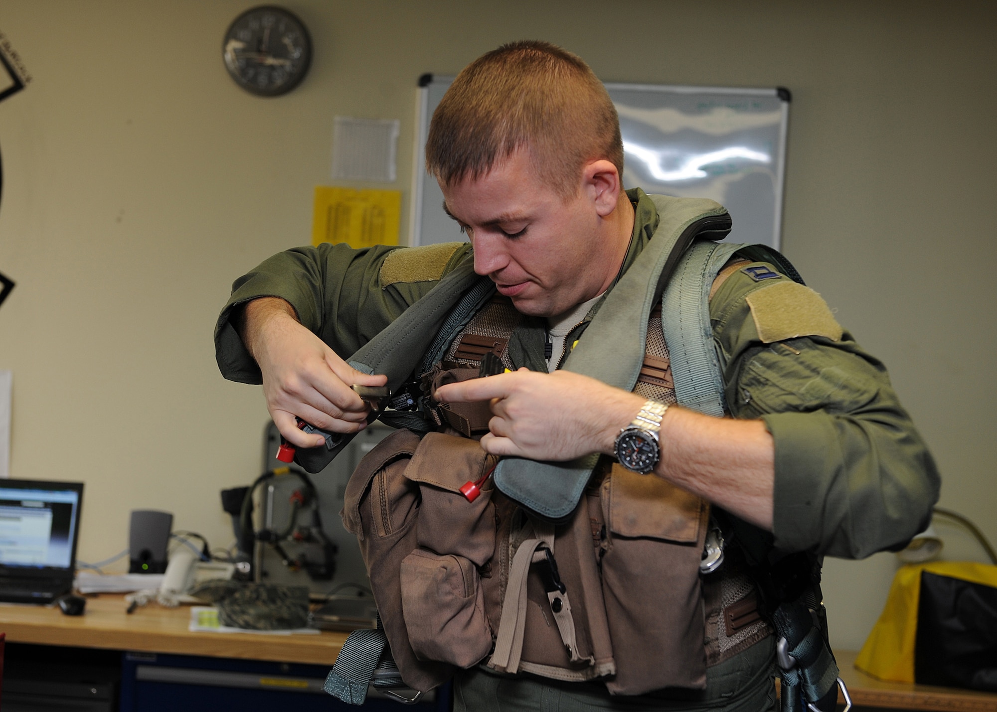 Capt. Alex Esson, with the 4th Expeditionary Fighter Squadron at Kunsan Air Base, Republic of Korea suits up before a flight during Max Thunder 12-2, Oct. 29, 2012. The 4th EFS is deployed from Hill Air Force Base, Utah and supporting Max Thunder, a joint exercise between U.S. and ROK air forces which tests bilateral combat capabilities in various scenarios. (U.S. Air Force photo/Staff Sgt. Jonathan Fowler)