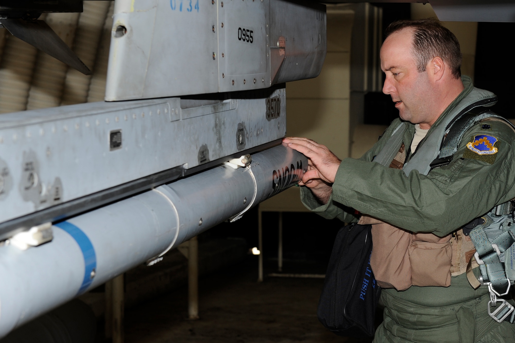 Lt. Col. Anthony Retka, 35th Fighter Squadron commander checks an F-16 Fighting Falcon before he takes off during Max Thunder 12-2 at Kunsan Air Base, Republic of Korea, Oct. 30, 2012. Max Thunder allowed U.S. and ROKAF pilots to train together while demonstrating air capabilities.  The training provided an unparalleled planning opportunity between U.S. and ROKAF. (U.S. Air Force photo/Senior Airman Marcus Morris)