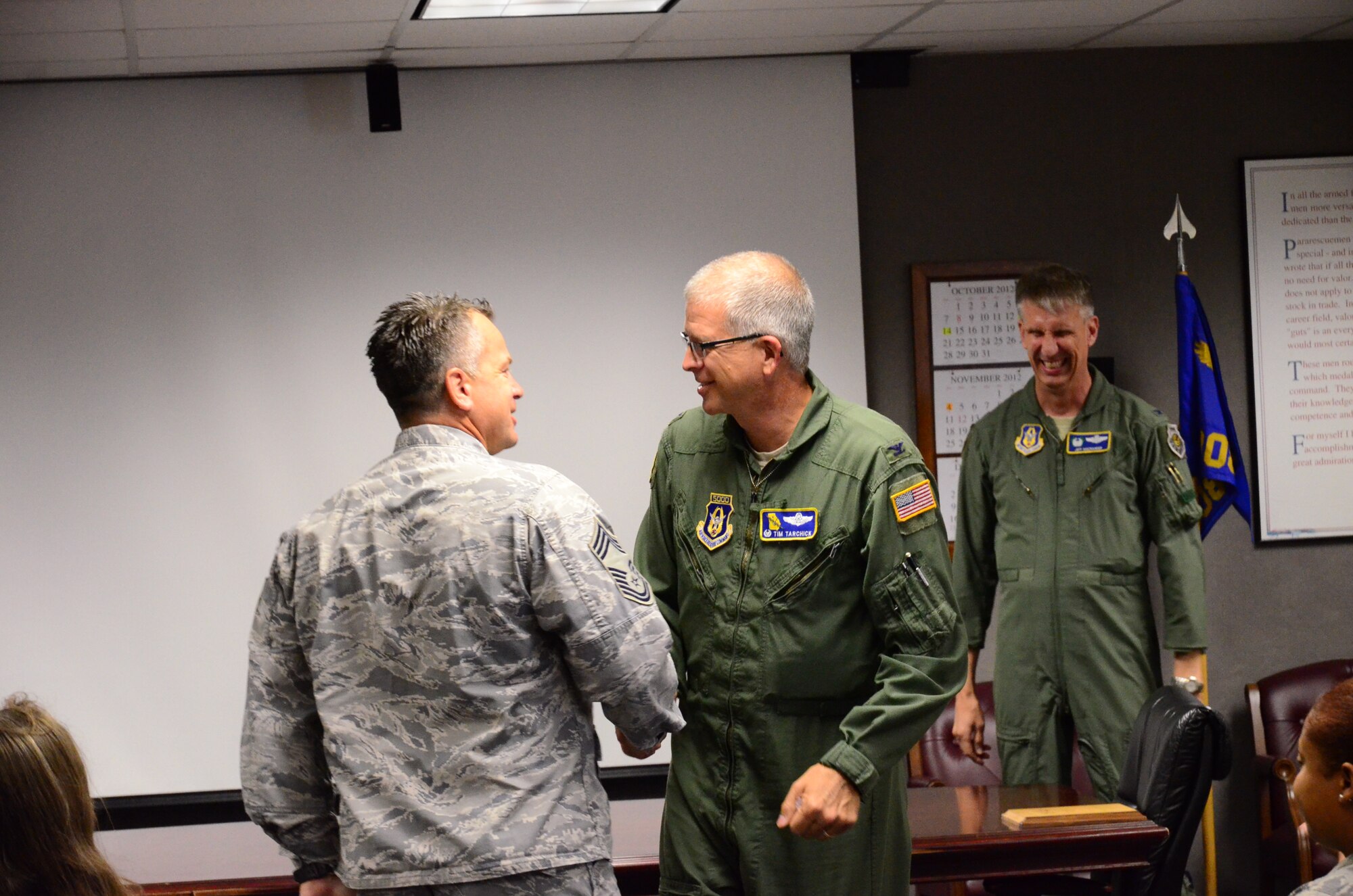 Col. Timothy E. Tarchick, 94th Airlift Wing commander and former commander of the 920th Rescue Wing, greets Chief Master Sgt. Doug Kestranek during a civic leader visit to Patrick AFB, Fla., Oct. 25.  (U.S. Air Force photo/Senior Airman Elizabeth Van Patten)