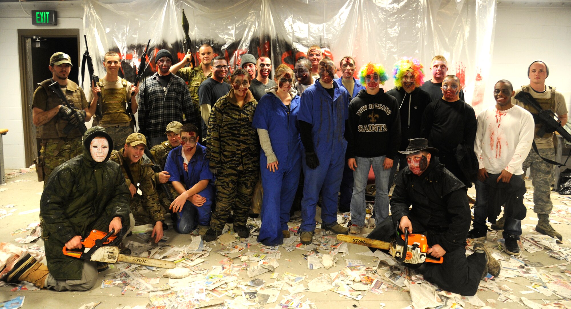 Members who participated in the bases annual haunted house hosted by the Survival School take a group photo at Fairchild Air Force Base, Wash., Oct. 28, 2012. The event was held Oct. 27-28 at 7 – 10 p.m. (U.S. Air Force photo by Airman 1st Class Ryan Zeski)