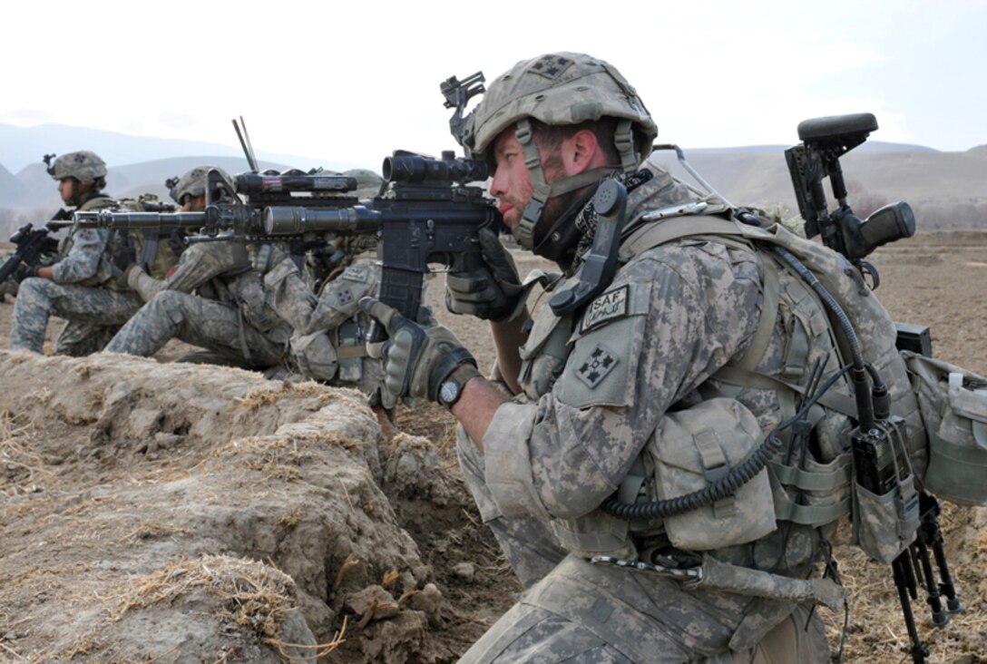 BADGHIS, Afghanistan -- U.S. Army Sgt. Jonathan Sweetman, Bulldog Troop, White Platoon, 7th Squadron, 10th Cavalry Regiment, looks through his rifle scope to scan for insurgents during a reconnaissance patrol near Combat Outpost Delorean, Bala Murghab, Badghis Province, Afghanistan Jan. 9, 2011. Sweetman led one of the four fire teams on the patrol and all four teams came under accurate small-arms fire. (U.S. Air Force photo/Master Sgt. Kevin Wallace/RELEASED)