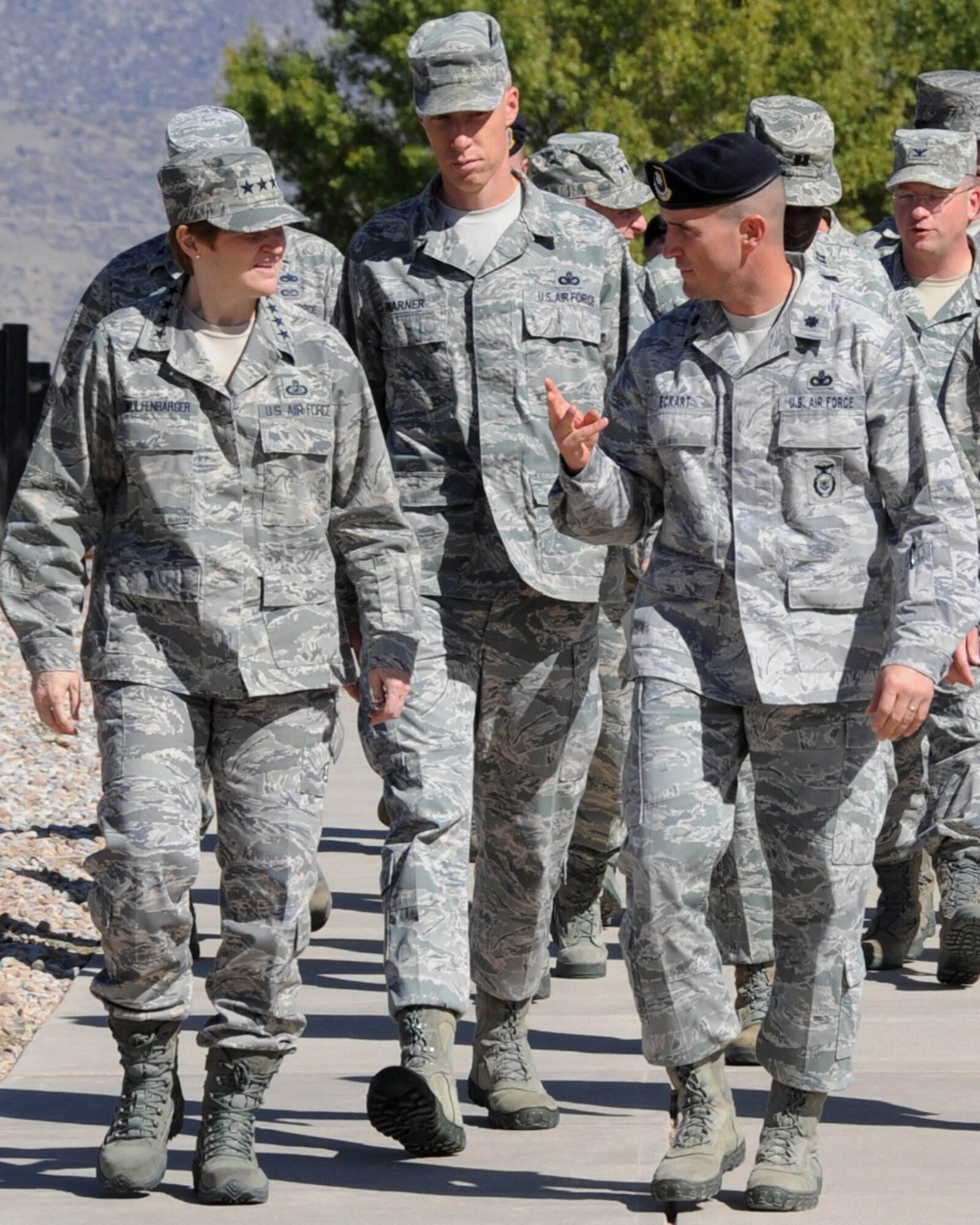 KIRTLAND AFB, N.M. -- Gen. Janet C. Wolfenbarger, Air Force Materiel Command commander, and Chief Master Sgt. Michael Warner, AFMC command chief, speak to Lt. Col. Bryan Eckart, 377th Weapons System Security Squadron commander, during a tour of the base Oct. 25. While here, the general toured the Air Force Nuclear Weapons Center, Air Force Research Laboratories and the 377th Air Base Wing. (Photo by Todd Berenger)