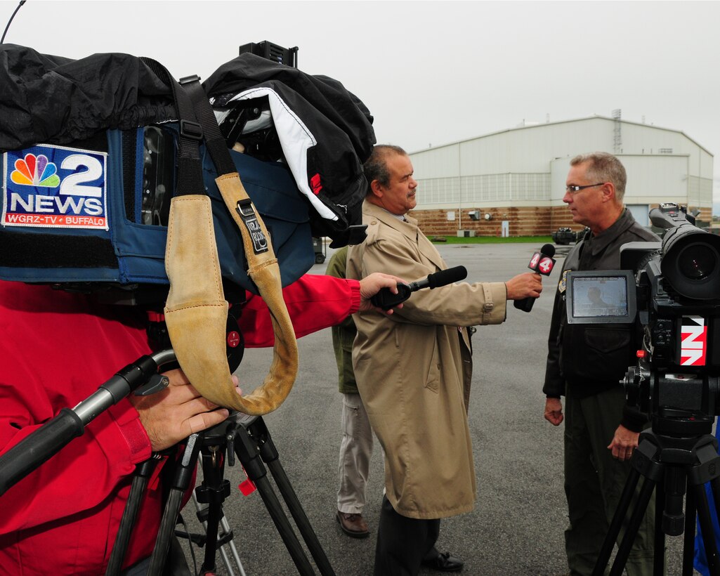 Col. Jim McCready, Jr., 107th Airlift Wing Commander speaks with local media at the Niagara Falls Air Reserve Station, N.Y. on October 30, 2012. Up to 75 members of the 107th are being deployed to the New York City area to help support relief efforts for Hurricane Sandy. (U.S. Air Force photo by Peter Borys)