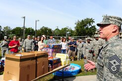 Chief Master Sgt. Earl Hannon, 628th Air Base Wing command chief, gives opening remarks before the 2012 Oktoberfest Oct. 26 at Joint Base Charleston - Air Base, S.C. Oktoberfest is an annual event put together by the First Six for ranks E-1 through E-6 to show appreciation for their day-to-day hard work. The event included free food and drinks, a disc jockey and a hot wing eating contest. Airmen also played games such as basketball and corn hole. (U.S. Air Force photo/ Airman 1st Class Chacarra Walker)