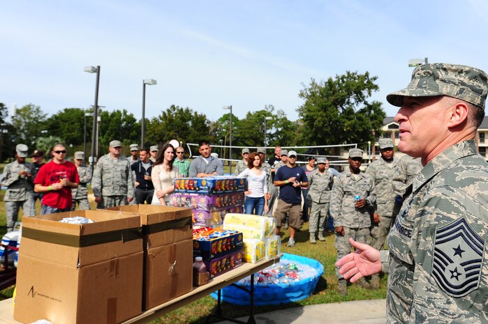 Chief Master Sgt. Earl Hannon, 628th Air Base Wing command chief, gives opening remarks before the2012 Oktoberfest Oct. 26 at Joint Base Charleston - Air Base, S.C. Oktoberfest is an annual event put together by the First Six for ranks E-1 through E-6 to show appreciation for their day-to-day hard work. The event included free food and drinks, a disc jockey and a hot wing eating contest. Airmen also played games such as basketball and corn hole. (U.S. Air Force photo/ Airman 1st Class Chacarra Walker)