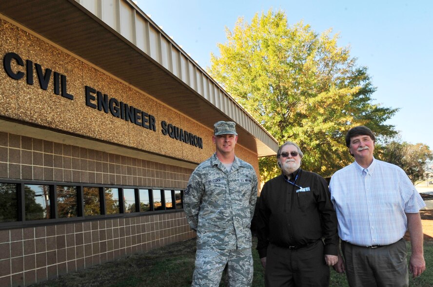U.S. Air Force Tech. Sgt. Brian Ailstock, 20th Civil Engineer Squadron military dorm leader ( left), Gary Hallmark, 20th CES community planner, and Joseph Sublet, 20th CES engineer pose for an annual awards group photo outside of the 20th CES building at Shaw Air Force Base, S.C., Oct. 30, 2012. 