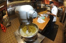 Baker Jessie Torres uses the mixing bowl to prepare a batch of cookies, Oct. 30 at the David Grant Medical Center dining facility. (U.S. Air Force photo/ Staff Sgt. Liliana Moreno)