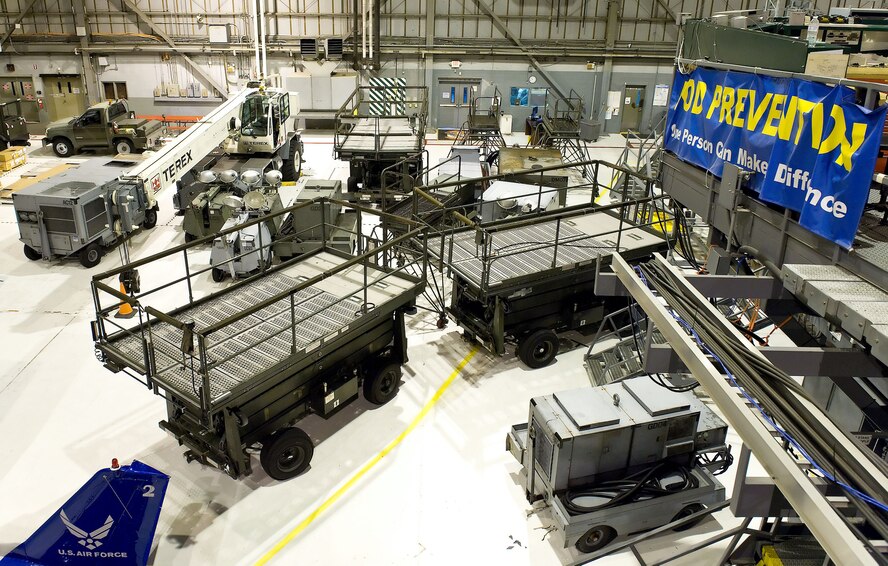 Aero Club aircraft, maintenance equipment and vehicles are parked inside hangar 711 Oct. 30, 2012, at Dover Air Force Base, Del. Aircraft and equipment were placed in the hangar prior to Hurricane Sandy?s arrival. (U.S. Air Force photo by Roland Balik)