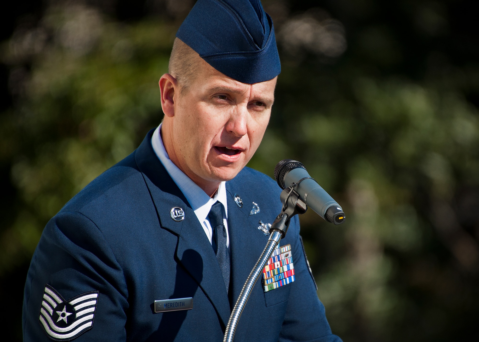 Tech. Sgt. Adam Meredith, of the 96th Explosive Ordnance Disposal Flight, speaks to the crowd about his fallen friend at the EOD building dedication ceremony Oct. 30 at Eglin Air Force Base, Fla.  The building was named the Douville EOD Facility after Tech. Sgt. Daniel Douville, a 96th EOD tech, who died in the line of duty during a deployment to Afghanistan in June 2011.  (U.S. Air Force photo/Samuel King Jr.)