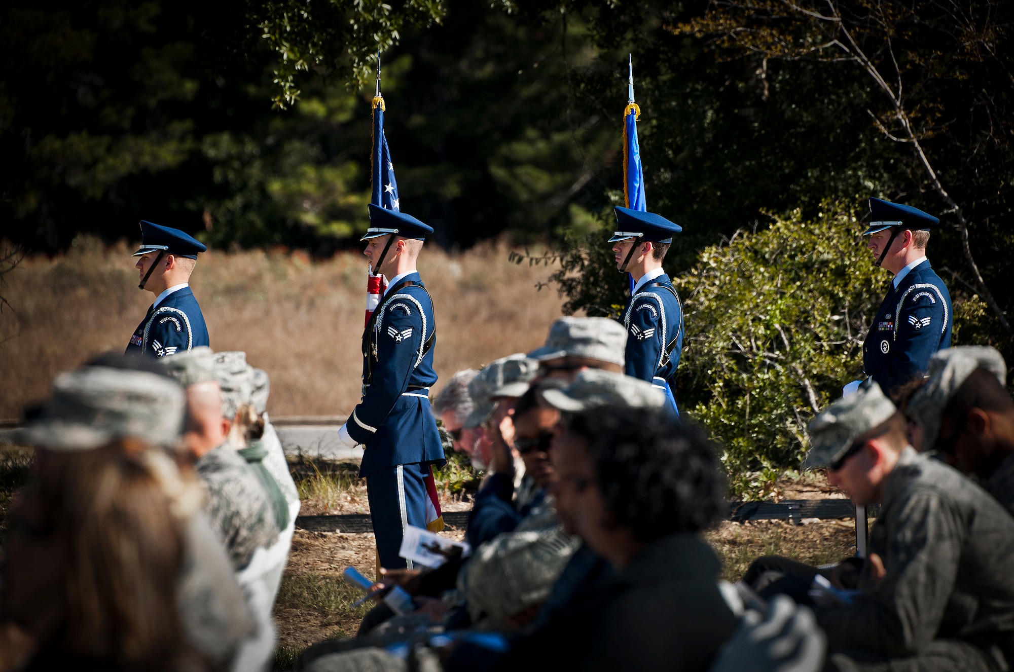 A flag detail from the Eglin honor guard wait to bring in the colors at the explosive ordnance disposal facility’s naming ceremony Oct. 30 at Eglin Air Force Base, Fla.  The building was named the Douville EOD Facility after Tech. Sgt. Daniel Douville, a 96th EOD tech, who died in the line of duty during a deployment to Afghanistan in June 2011.  (U.S. Air Force photo/Samuel King Jr.)