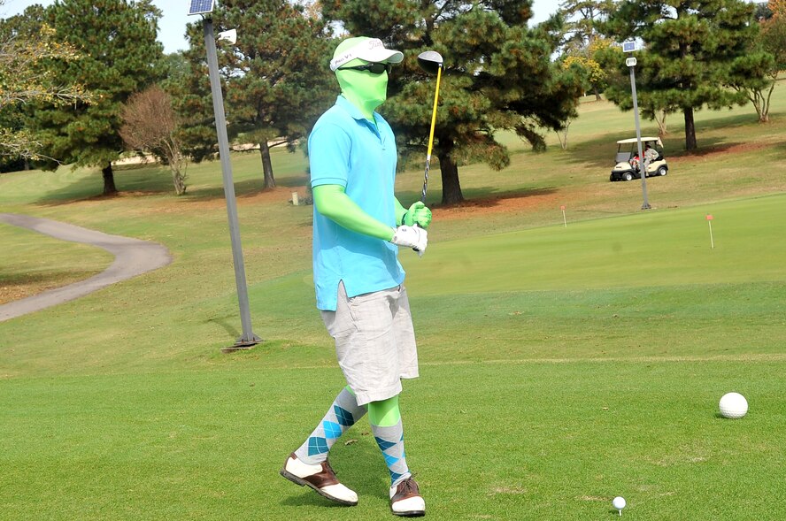 U.S. Air Force Staff Sgt. Alec Wilcher, 20th Operations Support Squadron, dresses as one of the “green men” for his costume as a part of a Halloween golf tournament, Shaw Air Force Base, S.C. Oct. 26, 2012. The tournament was held to help raise money for holiday events. (U.S. Air Force photo by Airman 1st Class Ashley L. Gardner/Released)