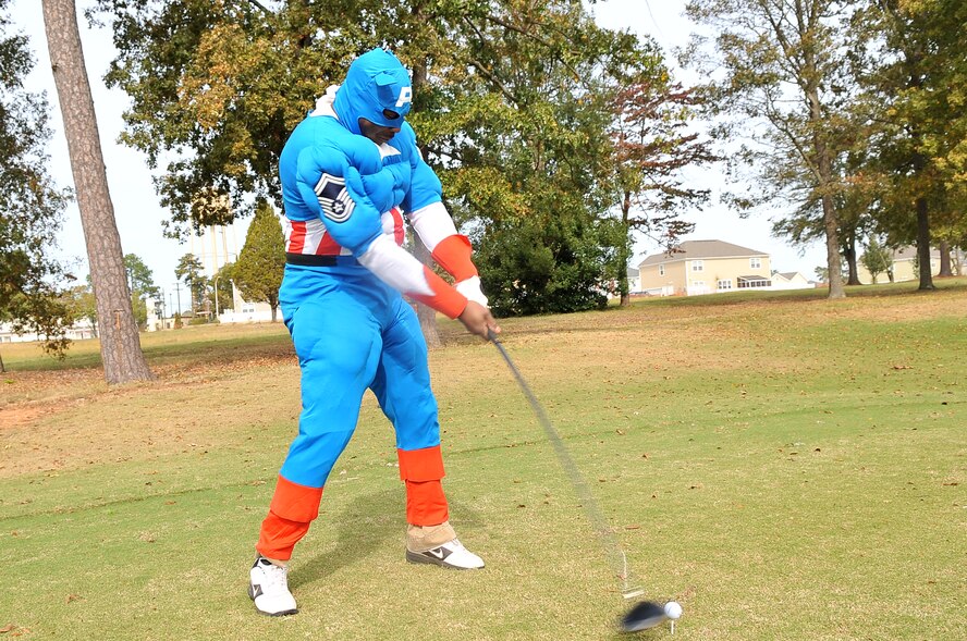 U.S. Air Force Senior Master Sgt. Richard Crivens, 20th Contracting Squadron superintendent, takes a swing in a round of golf, Shaw Air Force Base, S.C. Oct. 26, 2012. The tournament was held to help raise money for holiday events. (U.S. Air Force photo by Airman 1st Class Ashley L. Gardner/Released)