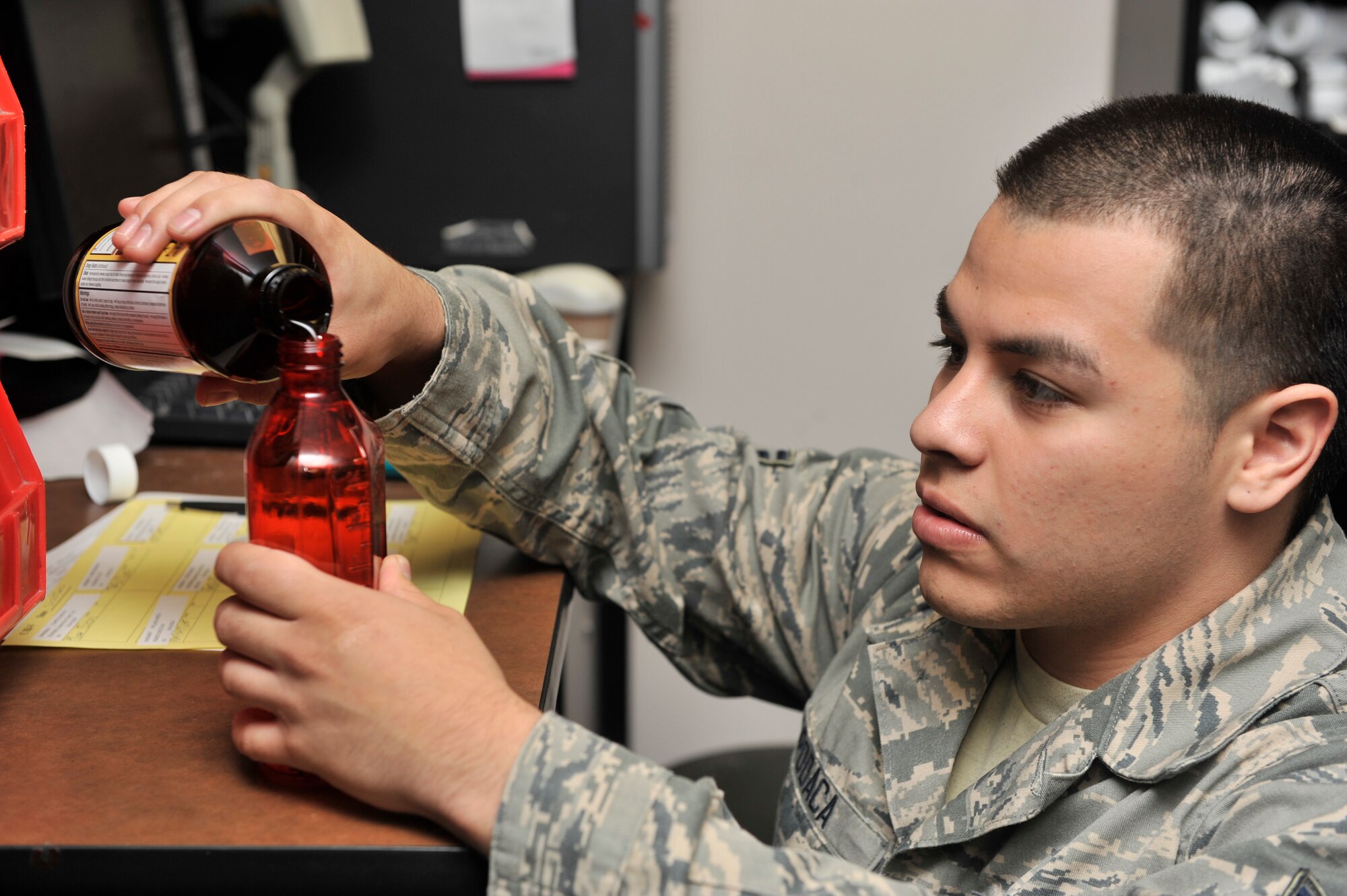 Airman 1st Class Cameron Apodaca, 20th Medical Group pharmacist technician, measures out controlled substances for patients inside the pharmacy, Shaw Air Force Base, S.C. Oct. 30, 2012. Team Shaw’s 20th MDG recently earned a superior rating in a Health Services Inspection and netted national re-accreditation from the Accreditation Association for Ambulatory Health Care. (U.S. Air Force photo by Staff Sgt. Ave Young/Released)