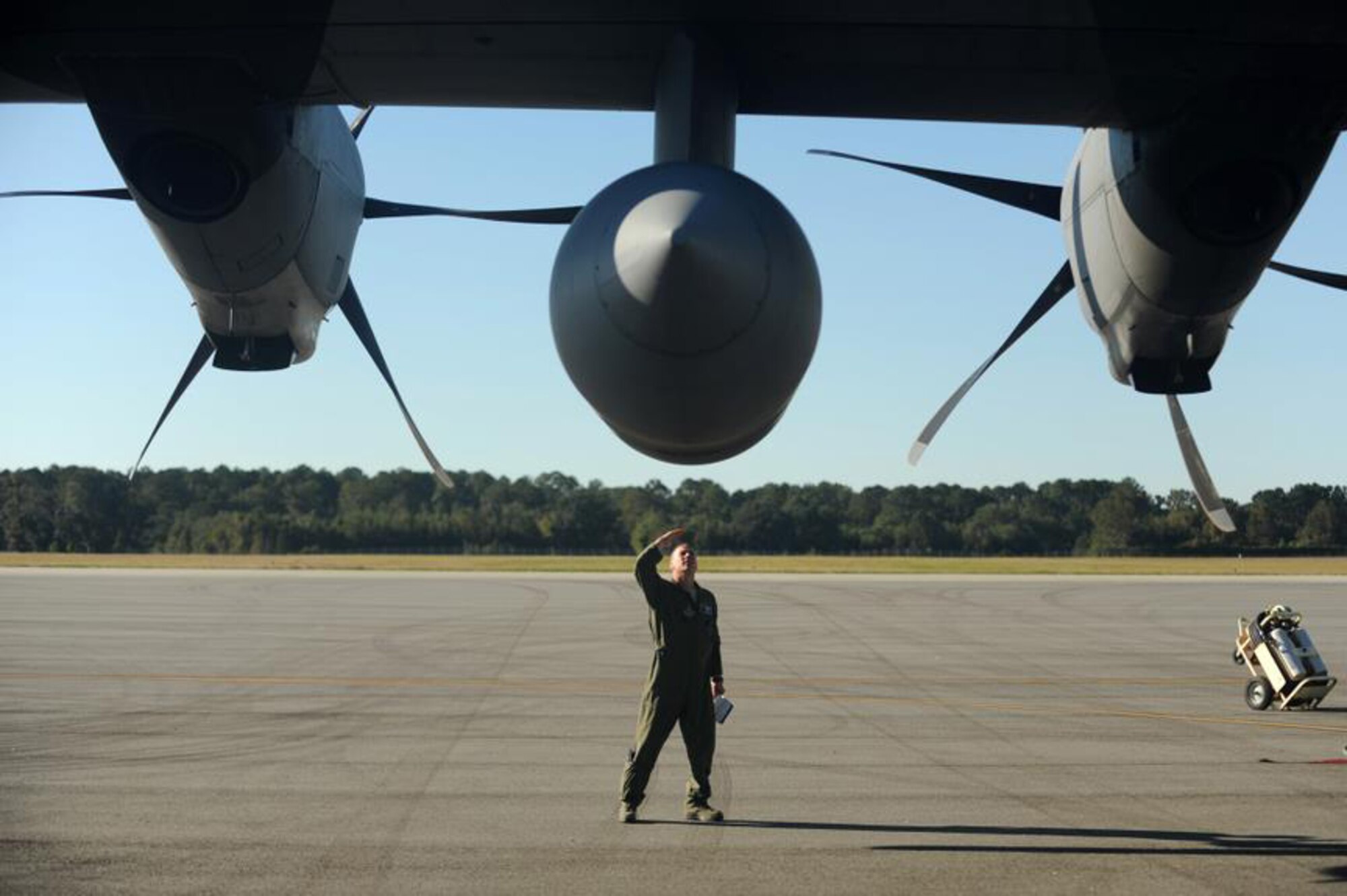 Tech. Sgt Chris Becyar, from the 53rd Weather Reconnaissance Squadron, conducts a pre-flight inspection on a WC-130J Hercules in preparation for a weather reconnaissance mission into Hurricane Sandy Oct. 29, 2012, at Hunter Army Airfield, Ga. The 53rd WRS conducted weather reconnaissance missions in preparation for Hurricane Sandy making landfall along the Eastern coastline of the United States. (U.S. Air Force photo/Staff Sgt. Jason Robertson)