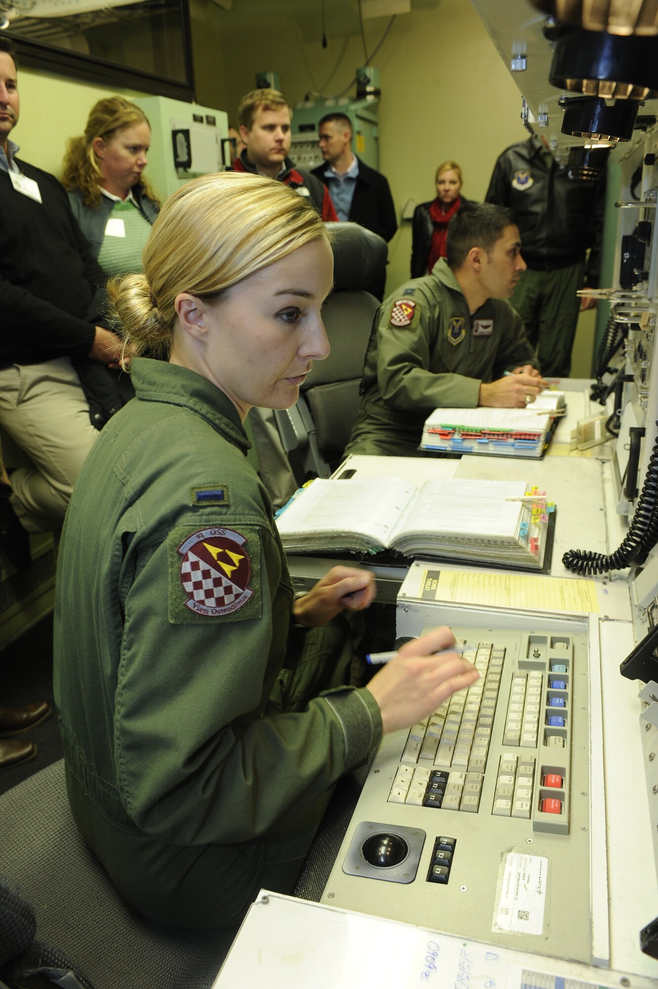 Local area congressional staffers tour the Missile Procedure Training room here, Oct. 25. The congressional staff visit was aimed at better acquainting the group on the essentialness of the Team Minot mission. 