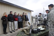 Members of the 91st Missile Security Forces Squadron, Tactical Response Force team, brief a group of congressional staff members on their mission duties in support of the deterrence mission here, Oct. 25. The congressional staff visit was aimed at better acquainting the group on the essentialness of the Team Minot mission. 