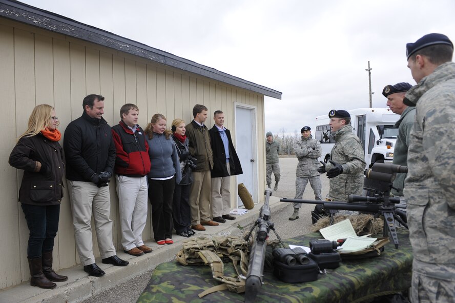 Members of the 91st Missile Security Forces Squadron, Tactical Response Force team, brief a group of congressional staff members on their mission duties in support of the deterrence mission here, Oct. 25. The congressional staff visit was aimed at better acquainting the group on the essentialness of the Team Minot mission. 