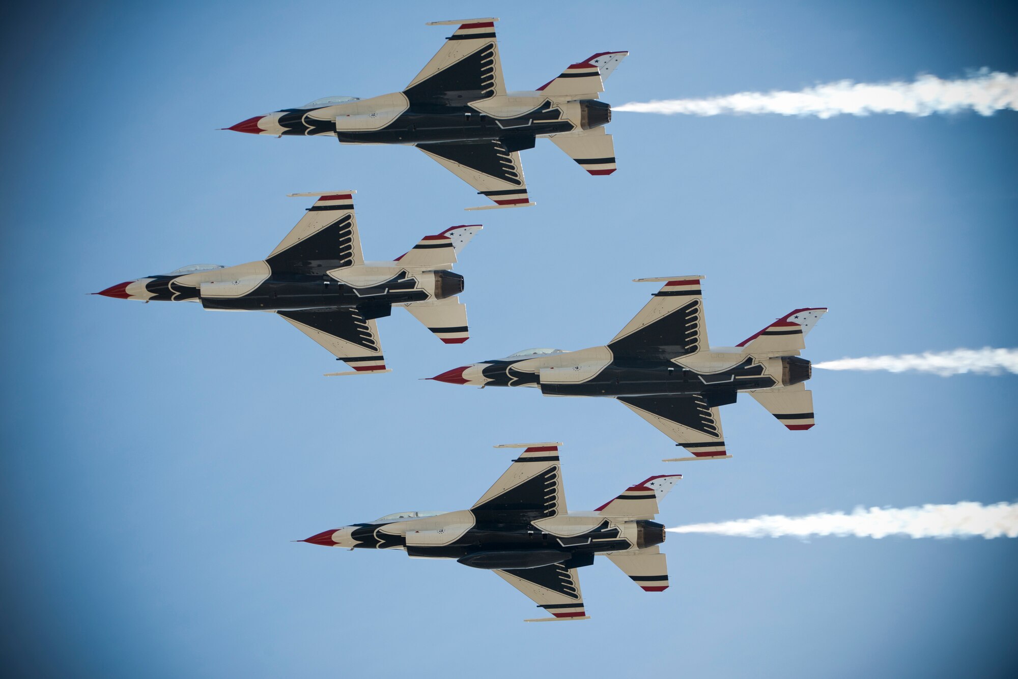 Four F-16 Thunderbird Fighting Falcons fly in formation during the Moody Air Force Base, Ga., Legacy of Liberty Open House air show Oct. 26, 2012. Millions of people have witnessed the Thunderbirds demonstrations, which reflect the pride, professionalism and dedication of hundreds of thousands of Airmen serving at home and abroad. (U.S. Air Force photo by Senior Airman Douglas Ellis/Released)
