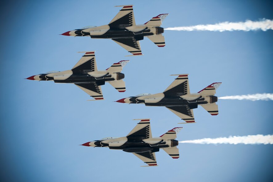 Four F-16 Thunderbird Fighting Falcons fly in formation during the Moody Air Force Base, Ga., Legacy of Liberty Open House air show Oct. 26, 2012. Millions of people have witnessed the Thunderbirds demonstrations, which reflect the pride, professionalism and dedication of hundreds of thousands of Airmen serving at home and abroad. (U.S. Air Force photo by Senior Airman Douglas Ellis/Released)
